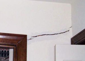 A large drywall crack in an interior wall in Ashburn